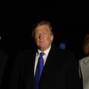 Le président Donald Trump et la première dame Melania Trump avec leur fils Barron Trump arrivent à la Maison Blanche à Washington, DC après avoir passé le week-end à Mar-a-Lago en Floride, le 18 février 2019