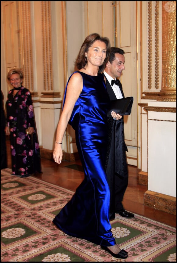 Nicolas Sarkozy et son ex-femme Cécilia Attias arrivant à la réception donnée à l'occasion de la visite du roi du Cambodge en France.