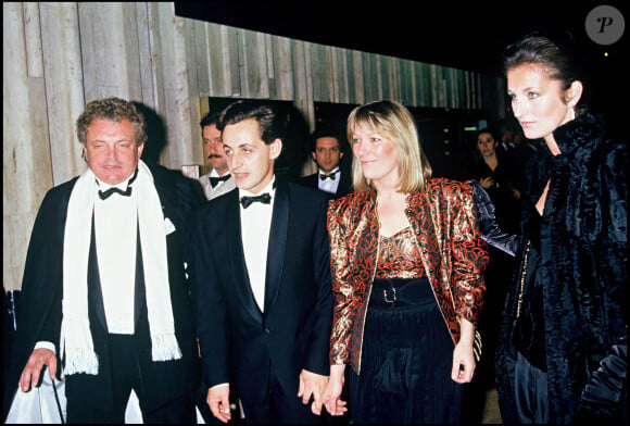 Jacques Martin et son ex-femme Cécilia Attias aux côtés de Nicolas Sarkozy et son ancienne épouse Dominique Culioli à la 91ème soirée "Erte" chez Maxim's à Paris en 1983.