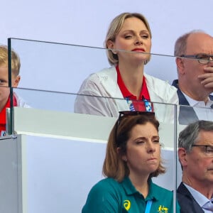 Le prince Albert II de Monaco, la princesse Charlène de Monaco, et leurs enfants, le prince Jacques de Monaco, marquis des Baux, et la princesse Gabriella de Monaco, comtesse de Carladès avec la princesse Anne et son mari Timothy Laurence en tribunes lors du match de Rugby à 7opposant la France à l'Afrique du Sud (19-5) lors des Jeux Olympiques (JO) de Paris 2024, au stade de France, à Sain t-Denis, Sein e Saint-Denis, le 27 juillert 2024. © Jacovides-Perusseau/Bestimage