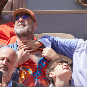 Eric Cantona et sa femme Rachida Brakni - Célébrités dans les tribunes de la finale Dames des Internationaux de Tennis de Roland Garros à Paris le 8 juin 2024. © Jacovides-Moreau/Bestimage 