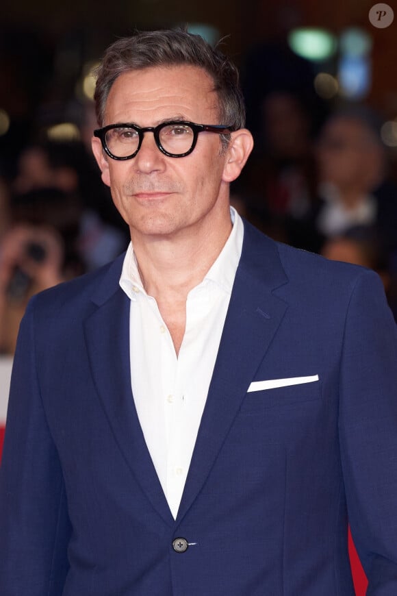 A cette même date, le réalisateur de "The Artist" s'est confié dans les colonnes du "Figaro".

Le réalisateur Michel Hazanavicius arrive à la projection du film "Coupez" lors de la 17ème édition du Festival International du Film de Rome, Italie, le 14 octobre 2022.