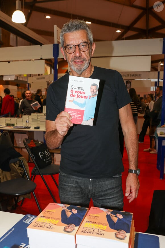 Michel Cymès, à la Halle Georges Brassens de Brive-la-Gaillarde pour la Foire du Livre de Brive , le 9 novembre 2024. © Jean-Marc Lhomer / Bestimage