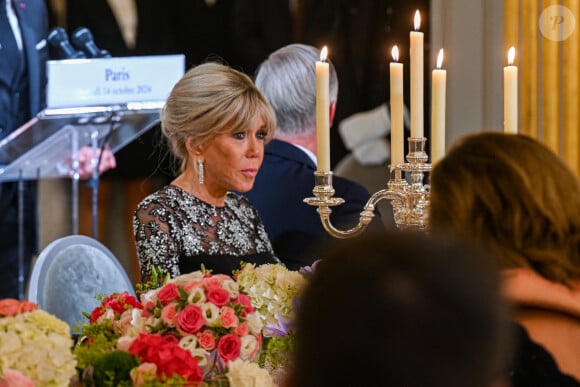 Le président Emmanuel Macron, Brigitte Macron, le roi Philippe et la reine Mathilde de Belgique lors du dîner d'état au palais de l'Elysée à Paris en l'honneur du couple royal de Belgique, en visite d'état à Paris le 14 octobre 2024. © Frédéric Andrieu / Bestimage 