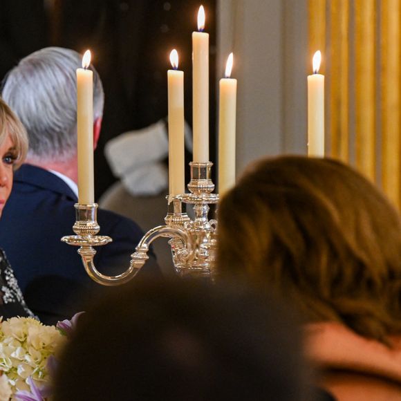 Le président Emmanuel Macron, Brigitte Macron, le roi Philippe et la reine Mathilde de Belgique lors du dîner d'état au palais de l'Elysée à Paris en l'honneur du couple royal de Belgique, en visite d'état à Paris le 14 octobre 2024. © Frédéric Andrieu / Bestimage 