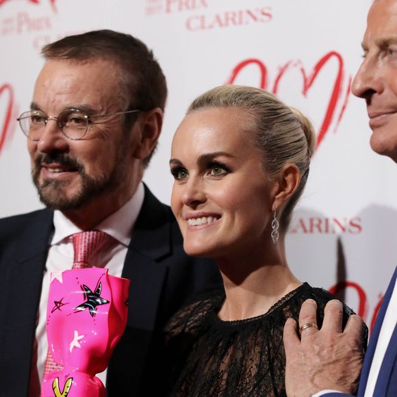 Exclusif - Dr Olivier Courtin-Clarins (président du directoire de Clarins), Laeticia Hallyday ("Femme de Coeur 2017" par Clarins pour son engagement humanitaire) et Christian Courtin-Clarins (président du conseil de surveillance de Clarins) - Le Prix Clarins pour l'enfance fête ses 20 ans et récompense sa nouvelle femme de coeur Laeticia Hallyday pour son association La Bonne Étoile à l'hôtel Salomon de Rothschild à Paris, France, le 14 mars 2017.  © Borde-Jacovides/Bestimage