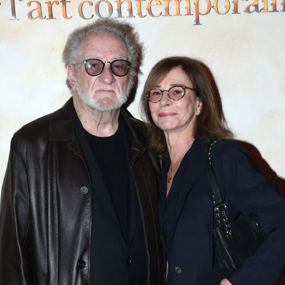 Eddy Mitchell et sa femme Muriel Bailleul - " Voir venir Venir voir ", Célébration des 40 ans de la Fondation Cartier pour l'art contemporain avec la " Traversée du chantier de la nouvelle Fondation Cartier ", place du Palais Royal, dont l'ouverture se fera en décembre 2025. Paris, France, le 18 octobre 2024. © Bertrand Rindoff/Bestimage 