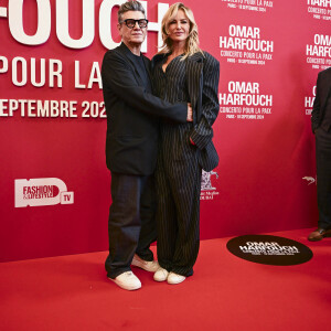 Marc Lavoine et sa compagne Adriana Karembeu au photocall du "concerto pour la paix" de Omar Harfouch au Théâtre des Champs-Elysées à Paris le 18 septembre 2024. © Perusseau / Tribeca / Bestimage 