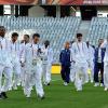 L'équipe de France de football reconnaît le terrain sud-africain, avant son premier match de Coupe du Monde, ce soir, face à l'Uruguay, le 11 juin 2010.