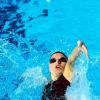 Charlene Wittstock a connu une belle carrière de nageuse, avant de rencontrer son prince.  Ici alors d'un meeting au Cannet, en France, en mai 2000.
