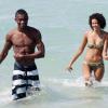 Le champion de foot ivoirien Salomon Kalou et sa superbe girlfiend Najah Wakil, lors de leurs vacances à Miami Beach, le 30 juin 2010.