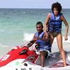 Le champion de foot ivoirien Salomon Kalou et sa superbe girlfiend Najah Wakil, lors de leurs vacances à Miami Beach, le 30 juin 2010.