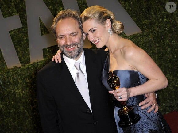 Le réalisateur britannique Sam Mendes et son ex-femme Kate Winslet, lors de la cérémonie des Oscars, à Los Angeles, en mars 2009.