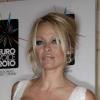 Pamela Anderson assiste à la conférence de presse de l'EuroVoice, l'émission qu'elle anime aux côtés d'Eric Serra, vendredi 24 septembre.