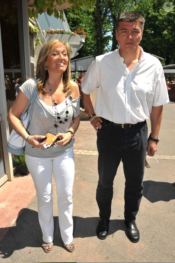 David Douillet et son épouse à Roland Garros, en juin 2010.