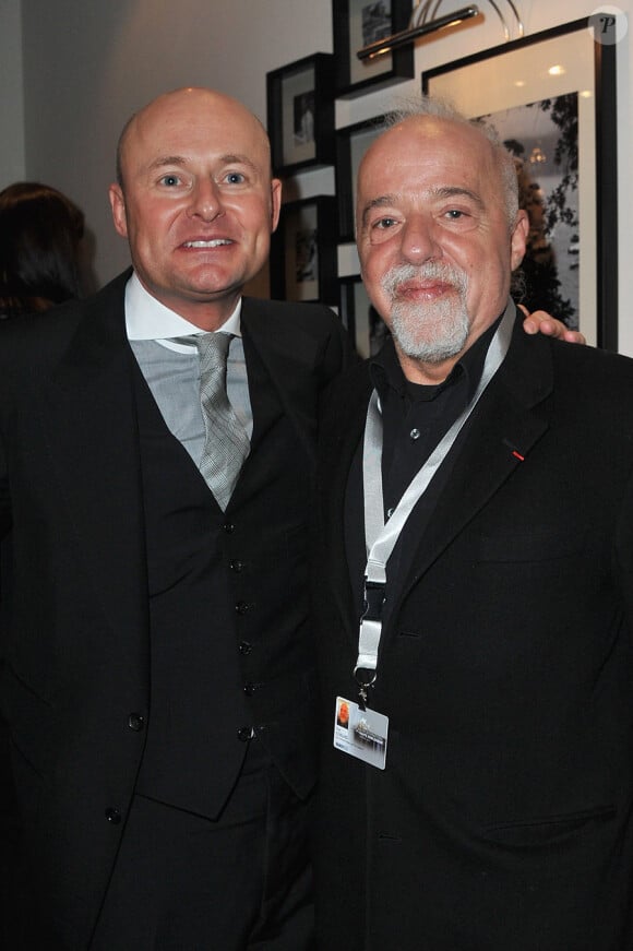Paolo Coelho et Georges Kern lors du lancement de la collection Portofino de la marque IWC présentée au 21e Salon de la Haute Horlogerie de Genève, le 18 janvier 2011
