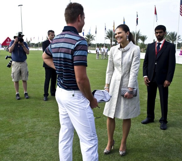 Victoria de Suède rend visite au joueur pro de golf Henrik Stenson à Abou Dabi le 20 janvier 2011