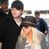Christina Aguilera et son nouveau chéri Matthew Rutler, à l'aéroport de Los Angeles, le 29 janvier 2011