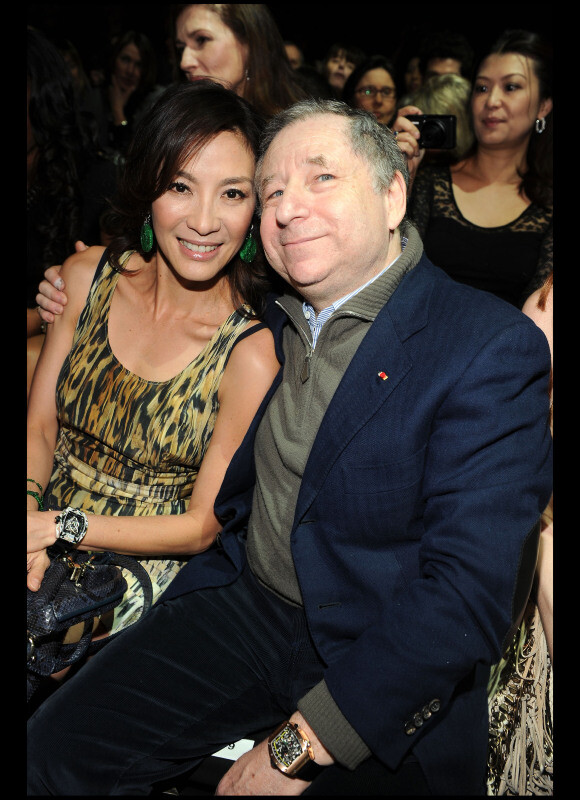 Michelle Yeoh et Jean Todt au défilé Roberto Cavalli à Milan durant la Fashion Week, le 26 février 2011.