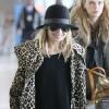 Nicole Richie arrive à l'aéroport de Roissy Charles de Gaule pour assister à la Fashion Week, à Paris, le 3 mars 2011.