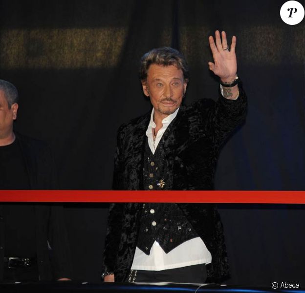 Johnny Hallyday présente son album Jamais Seul, au Virgin Megastore des Champs-Elysées, à Paris. 27/03/2011