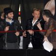 Johnny Hallyday présente son album Jamais Seul, au Virgin Megastore des Champs-Elysées, à Paris. Matthieu Chedid est à ses côtés. 27/03/2011