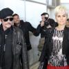 Johnny Hallyday et Laeticia à l'aéroport de Paris en partance pour Los Angeles, le 31 mars 2011.