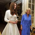 Le Prince William et Catherine, Duchesse de Cambridge en tenue de soirée  pour terminer une journée féérique