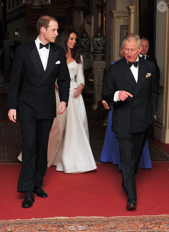 Le Prince William, le Prince Charles et Catherine, Duchesse de Cambridge en tenue de soirée  pour terminer une journée féérique, à Londres, le 29 avril 2011.