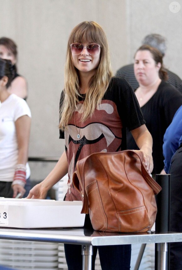 Olivia Wilde est rock'n roll à l'aéroport de Los Angeles le 3 mai 2011.