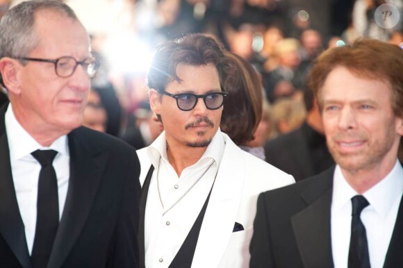 Johnny Depp et Geoffrey Rush lors de la projection de Pirates des Caraïbes, La Fontaine de Jouvence, le samedi 14 mai 2011.