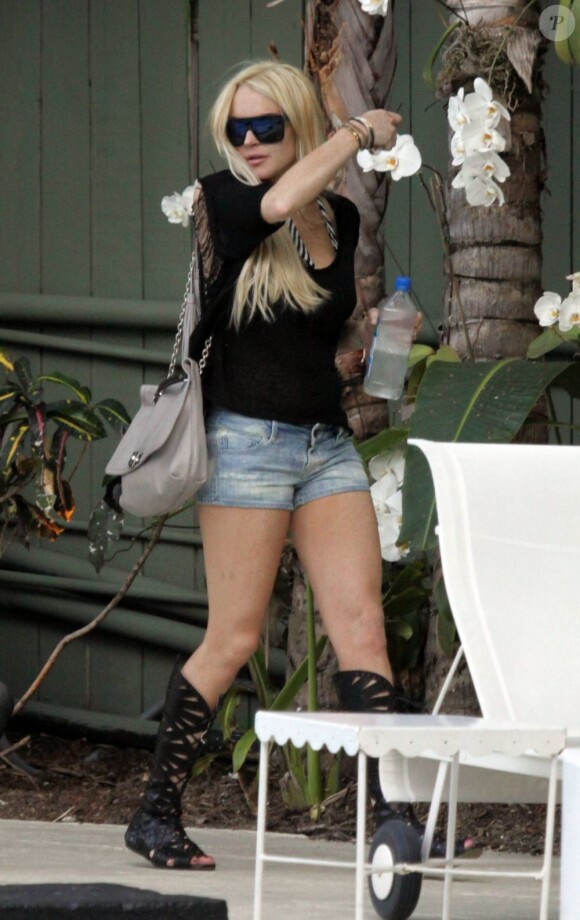 Lindsay Lohan affiche un look toujours aussi peu étudié... Miami 22 mai 2011