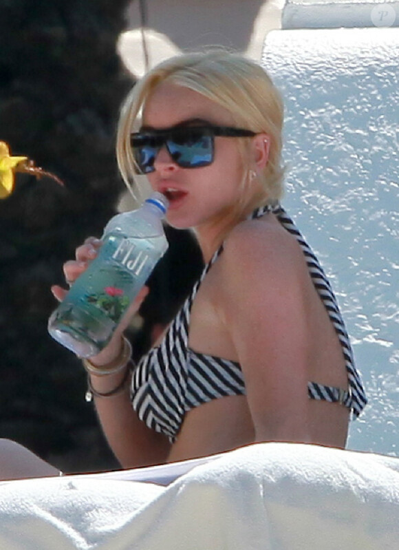 Lindsay Lohan se repose sous le soleil de Floride après ses problèmes avec la justice. Miami, 22 mai 2011