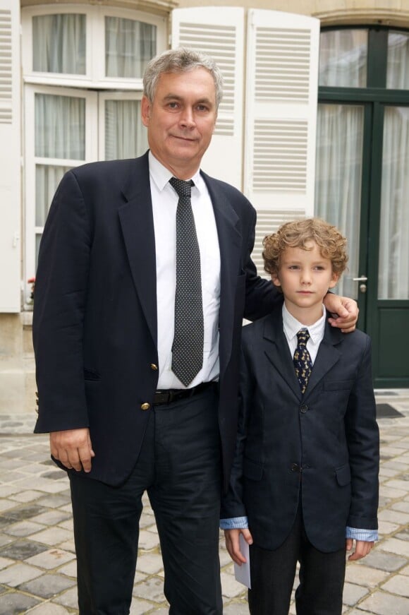 Laurent Laffont et Paul lors du déjeuner Père & Fils, au Taillevent, à Paris, le mardi 14 juin 2011.