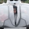 John Travolta, pilote émérite, fait un tour en hélicoptère depuis l'héliport de Paris afin de se rendre au Bourget pour un événement de la marque Breitling le 21 juin 2011