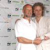 Le festival de Glastonbury, malgré ses 150 000 adeptes en 2011, a accusé un déficit de 25 millions d'euros. Son organisateur, Michael Eavis (photo : en 2005 avec Bob Geldof), prédit la mort du rendez-vous à court terme...