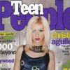 C'est avec le pouce dans le pantalon que Christina Aguilera pose pour Teen People. Décembre 1999.