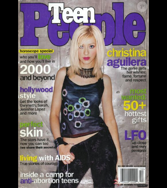 C'est avec le pouce dans le pantalon que Christina Aguilera pose pour Teen People. Décembre 1999.
