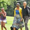 Barack Obama et sa famille, de retour de Camp David, leur résidence de vacances. Le 7 août dans la pelouse de la Maison Blanche