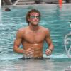 Diego Forlan, 32 ans, star uruguayenne de l'Atletico Madrid, se détend (photo : le 8 août 2011) à Miami en attendant la reprise de la Liga.