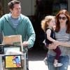 Alyson Hannigan fait des courses avec son mari Alexis Denisof et leur fille Satyana, à Los Angeles le 13 août 2011