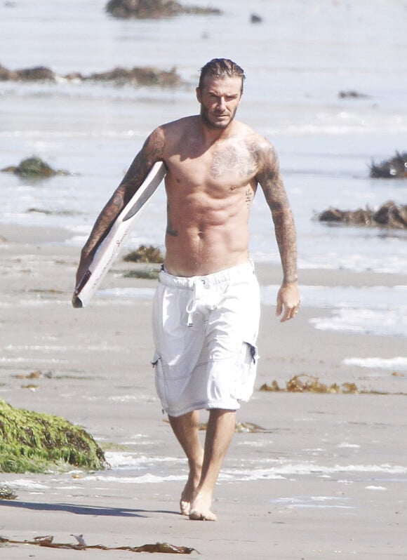 David Beckham et son corps de rêve à la plage à Malibu, le 27 août 2011
