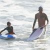 David Beckham à la plage à Malibu avec ses fils Brooklyn, Romeo et Cruz, le 27 août 2011