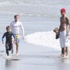 David Beckham à la plage à Malibu avec ses fils Brooklyn, Romeo et Cruz, le 27 août 2011