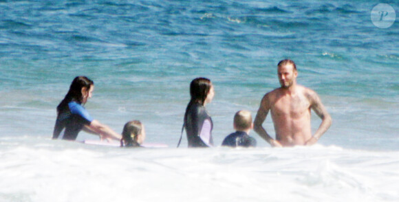 David Beckham et sa musculature de rève sur les plages de Malibu durant une sortie plage avec ses enfants au mois d'août
