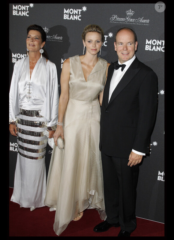Albert de Monaco, Caroline et Charlene lors de la présentation de la collection Montblanc dédiée à la princesse Grace. Le jeudi 8 septembre 2011, à l'Opéra