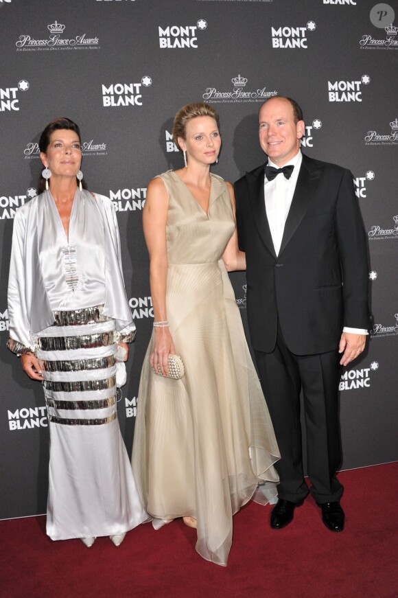 Albert et Charlene, avec Caroline de Monaco, présentent la collection hommage à la princesse Grace, le 8 septembre 2011.