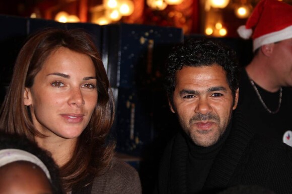 Jamel Debbouze et Melissa Theuriau arrivent au Noël du Secours Populaire en décembre 2009.