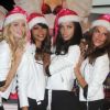 Lindsay Ellingson, Chanel Iman, Adriana Lima et Alessandra Ambrosio dévoilent leur cadeau préféré dans la boutique Victoria's Secret d'Herald Square à New York le 21 novembre 2011 