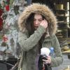 Megan Fox sort de chez le coiffeur et se protège de la pluie à Los Angeles le 12 décembre 2011